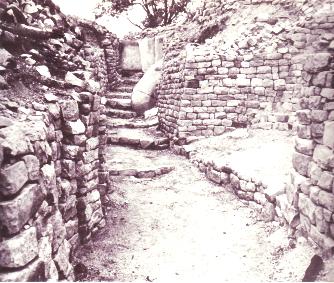Stone ruins of a ruler's palace at Bulawayo, standing in open grassland.