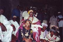 Founder Remi Omodele seated in the foreground with His Royal Highness, Oba Adegboye, behind.